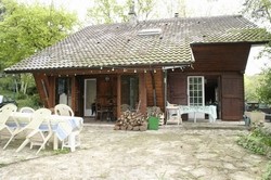maison en bois parmain